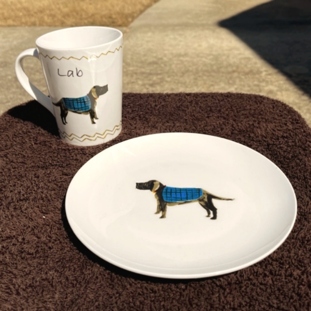 A collectible plate and dog set